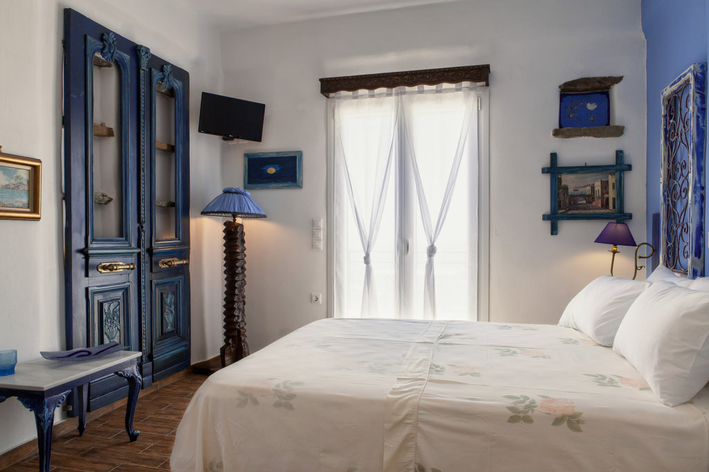 Castria studios blue bedroom king bed | castriastudios.com